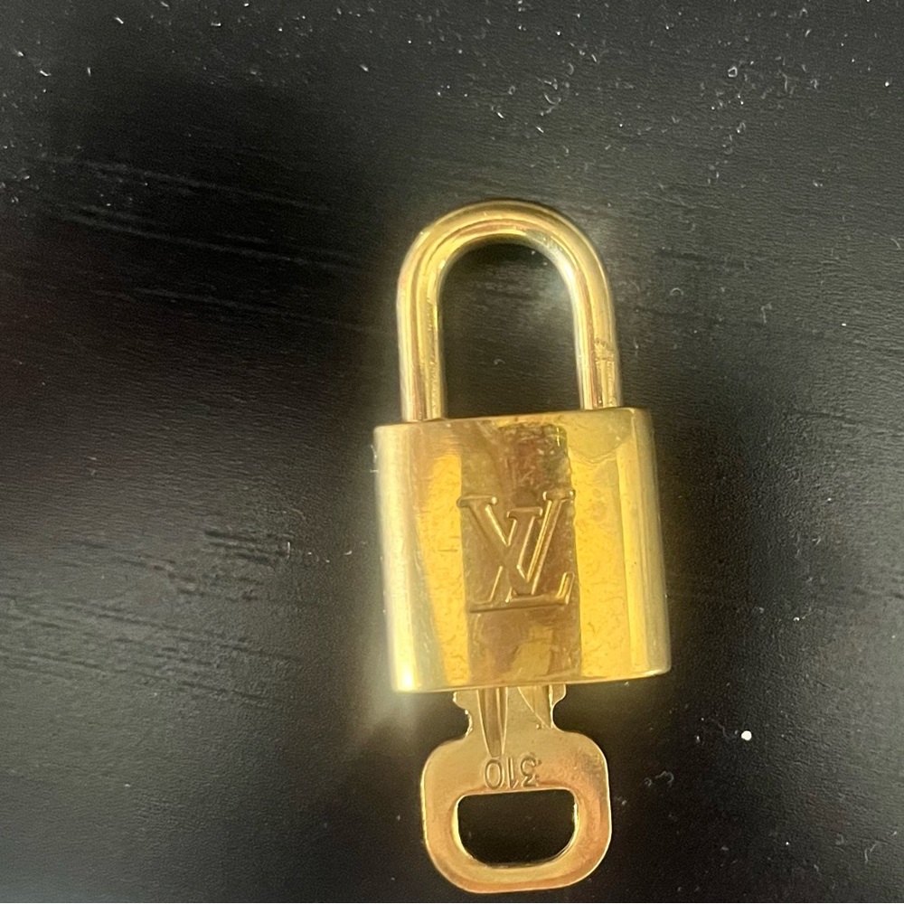 Louis Vuitton Gold Padlock with Key Authentic